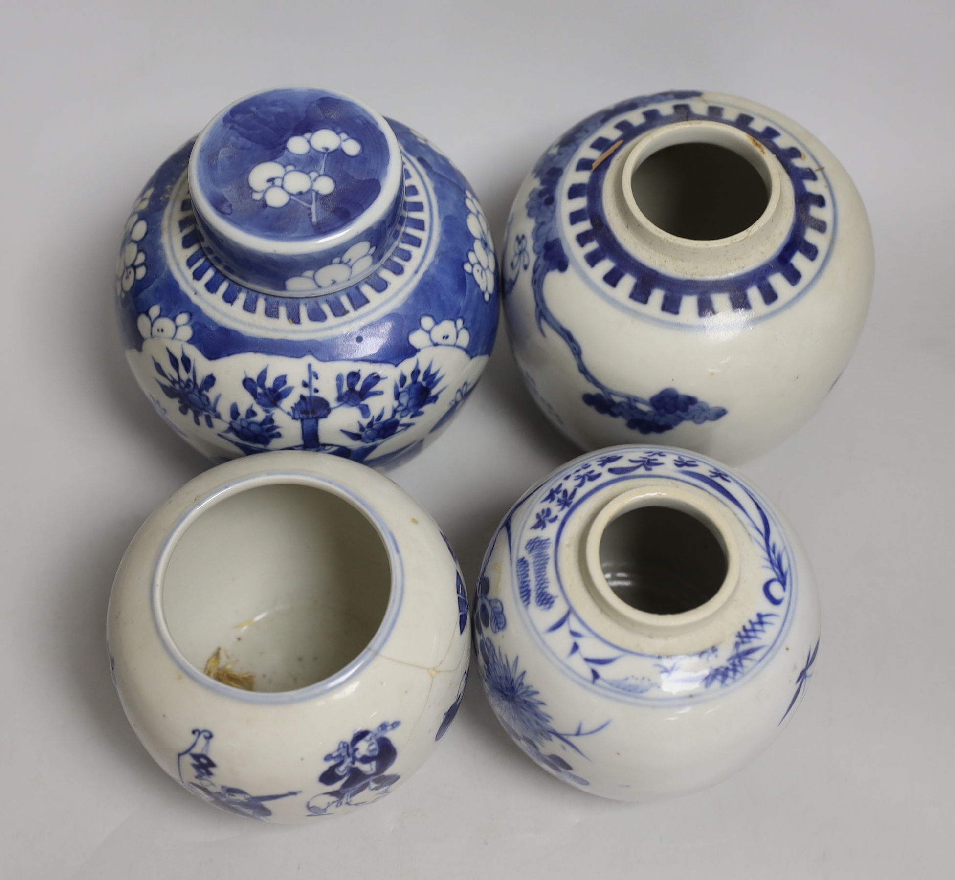 Four assorted late 19th century Chinese blue and white pots, tallest 15cm (a.f.)